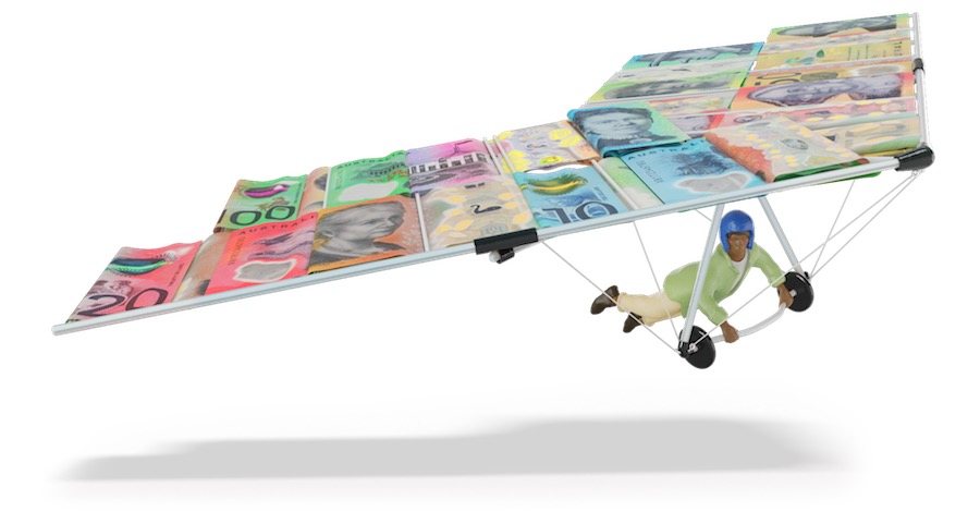 A person hang gliding in a plane made of money